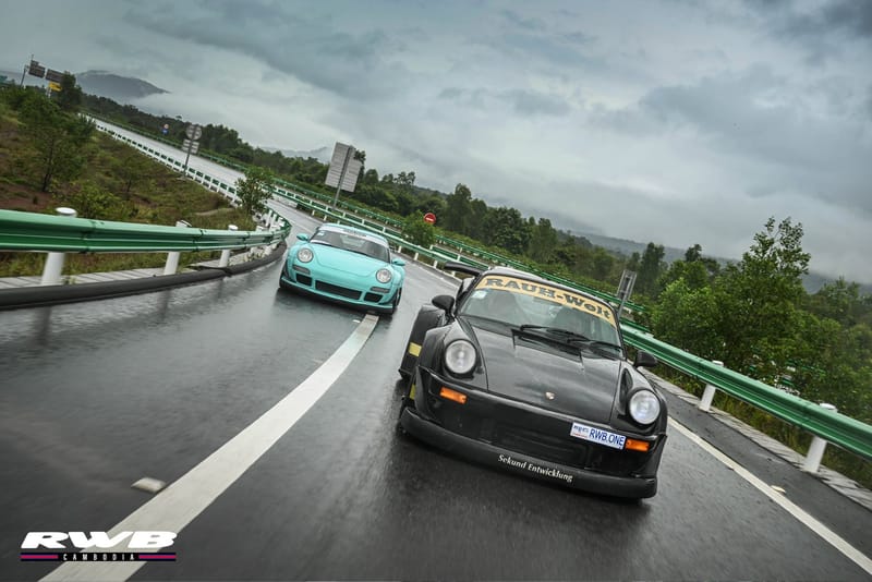 Two cars in the rain