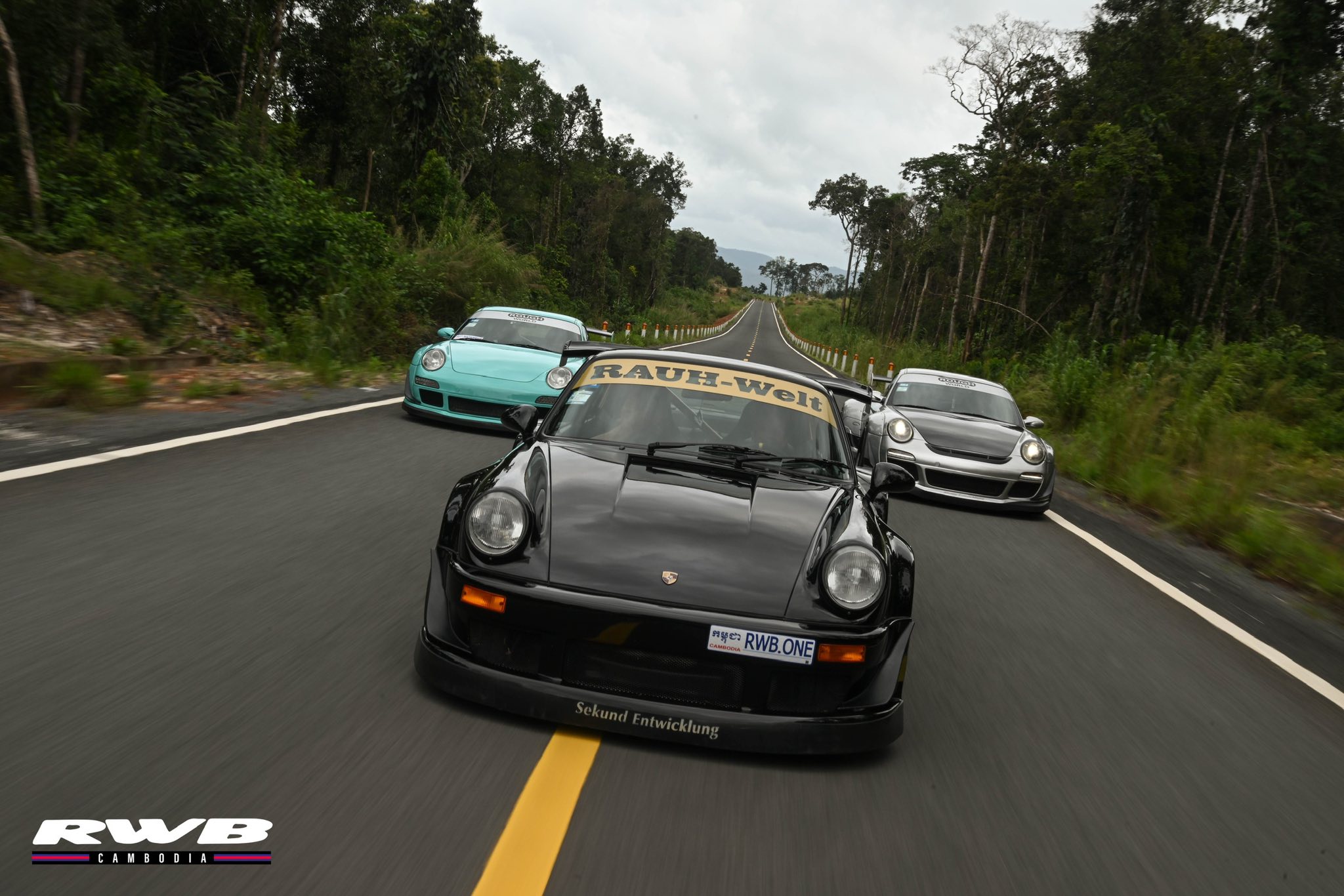 RWB Cambodia cars on mountain road